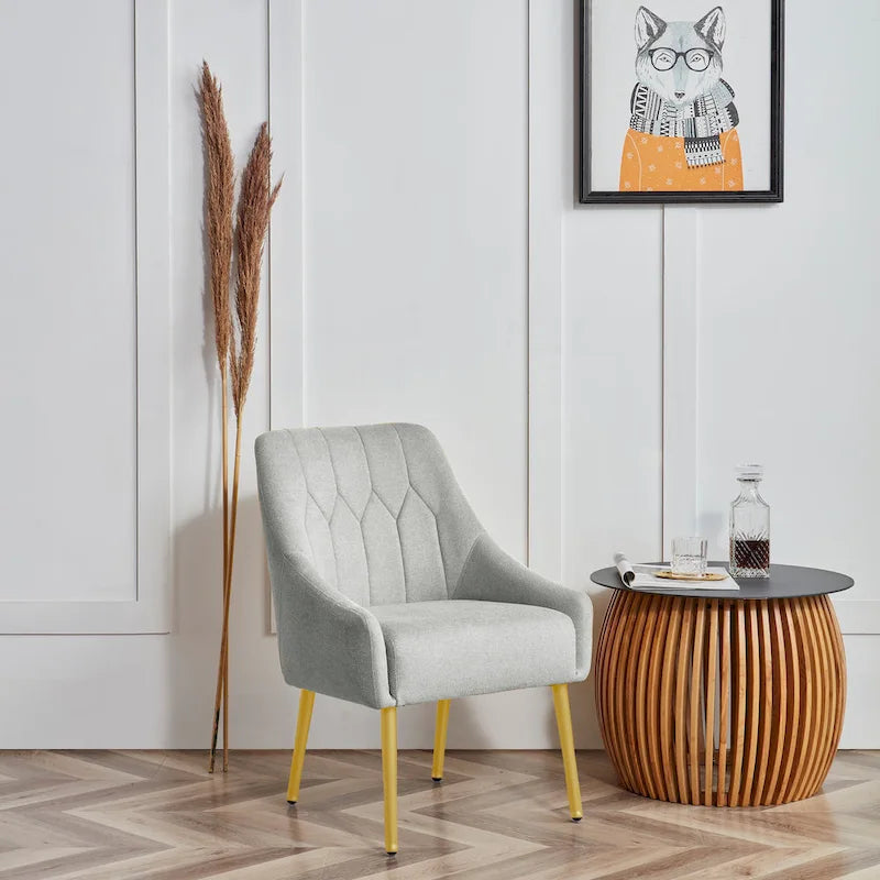 Sedia d'accento imbottita Glam con gambe in metallo dorato o nero